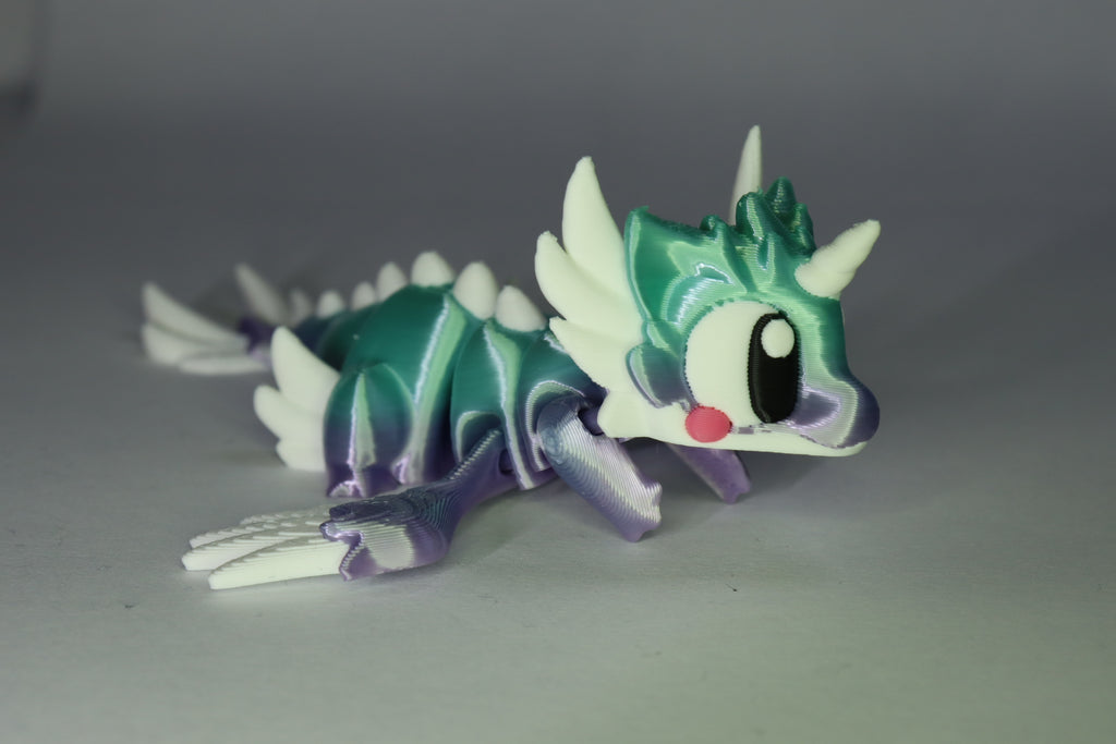 ProtoDrache Auroria bewegliche 3D-Drachenfigur in Türkis Lila und Weiss