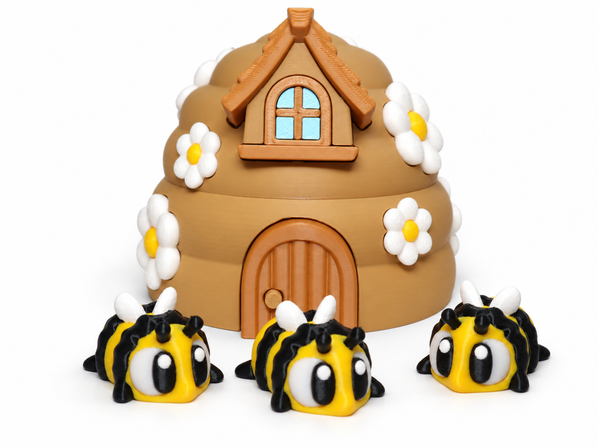 Drei Bienenfiguren Schwarz vor dem Bienenhaus Spielset