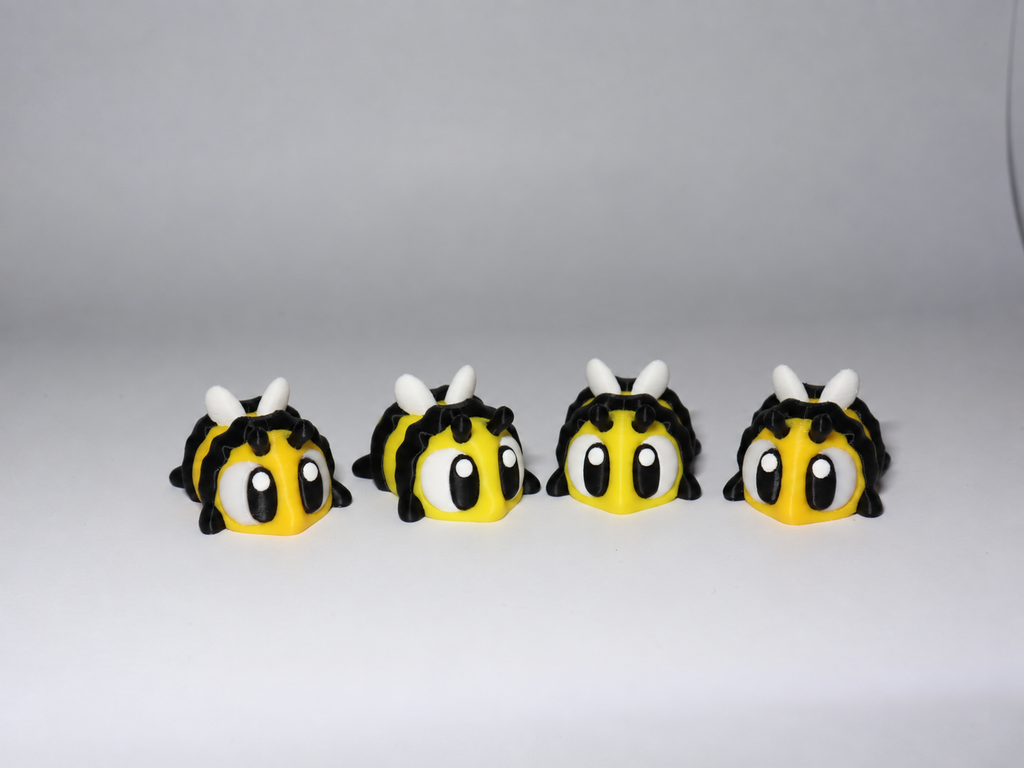 Set mit 4 beweglichen Bienenfiguren Schwarz Gelb mit weissen Flügeln
