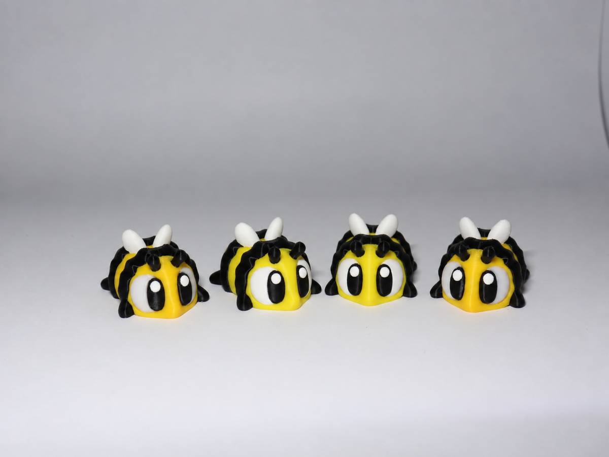 Set mit 4 beweglichen Bienenfiguren Schwarz Gelb mit weissen Flügeln
