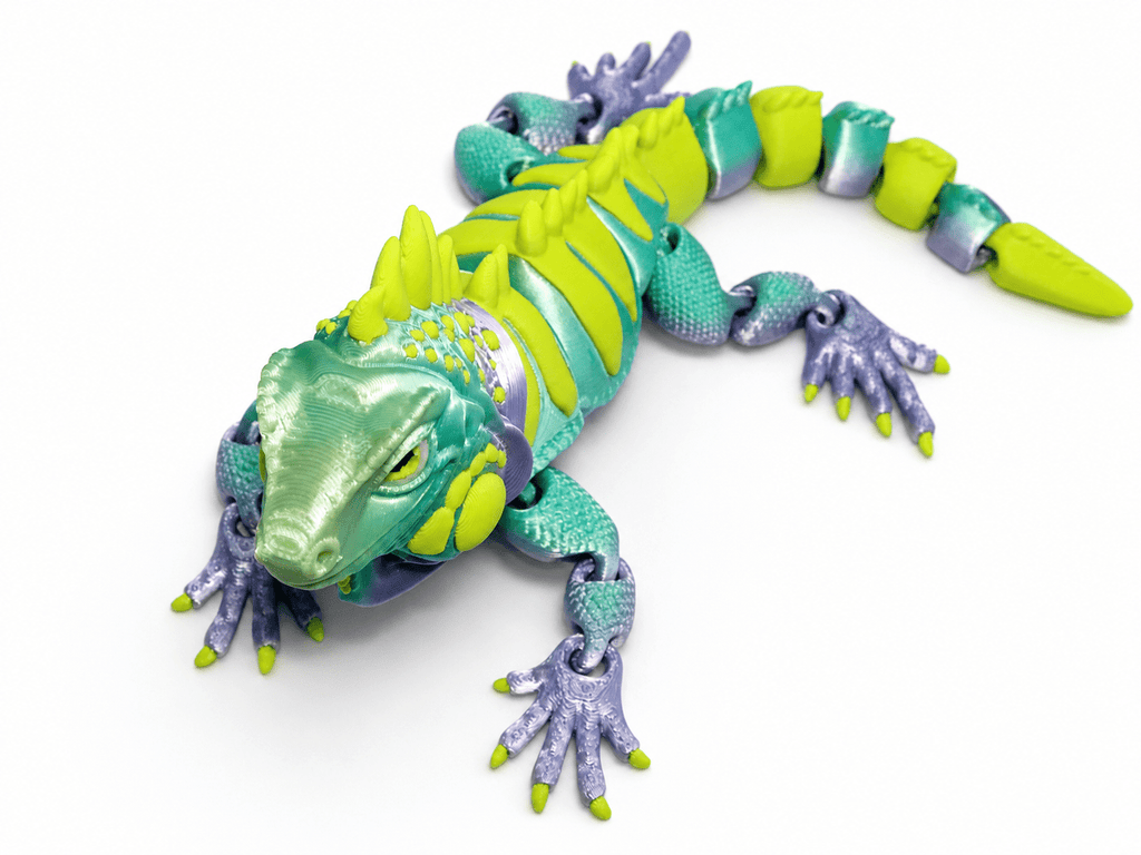 Leguan Neonstachel als bewegliche 3D-Figur in Türkis, Grün und Violett mit gelbgrünem Rückenkamm und gegliedertem Schwanz