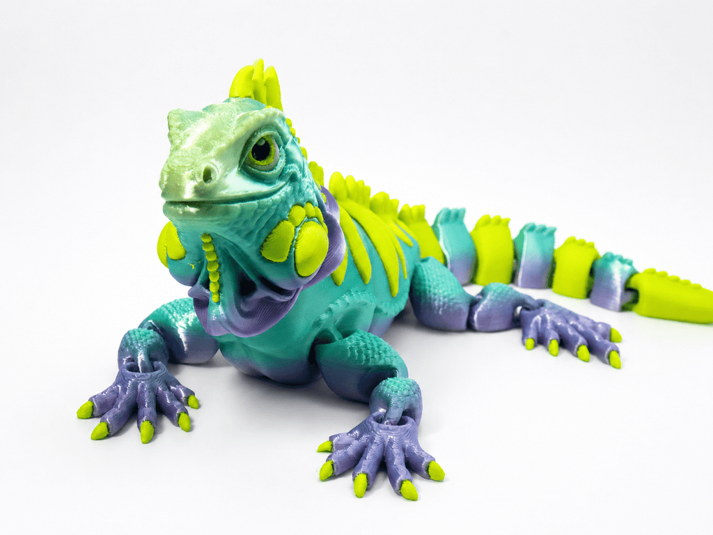 Leguan Neonstachel als bewegliche 3D-Figur in Türkis, Grün und Violett mit leuchtenden Akzenten, Rückenkamm und langem Schwanz